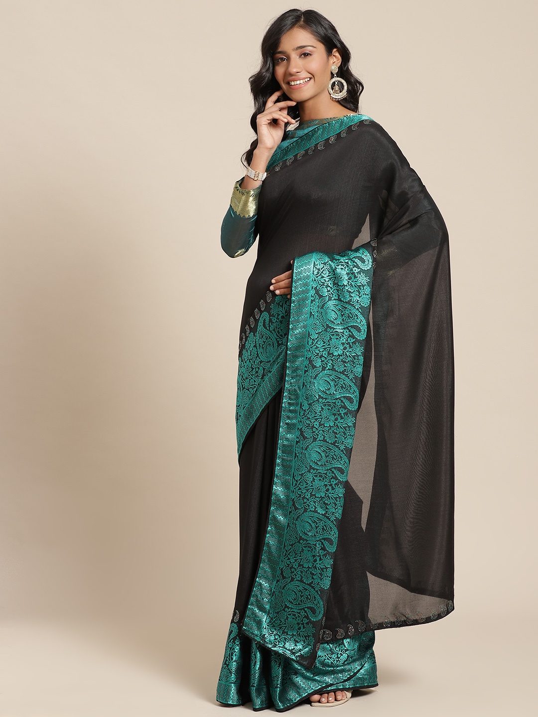 

Chhabra 555 Black & Green Solid Saree With Woven Design Border
