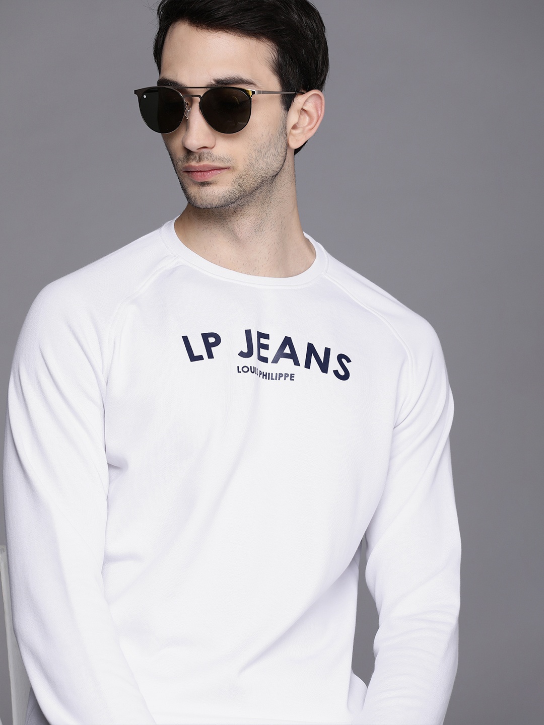 

Louis Philippe Jeans Men White Solid Pullover Sweatshirt