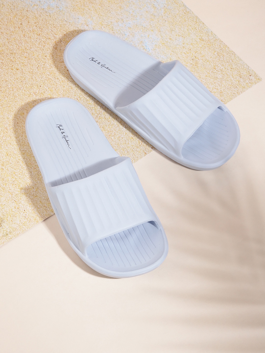 

Mast & Harbour Women Blue Self Striped Sliders