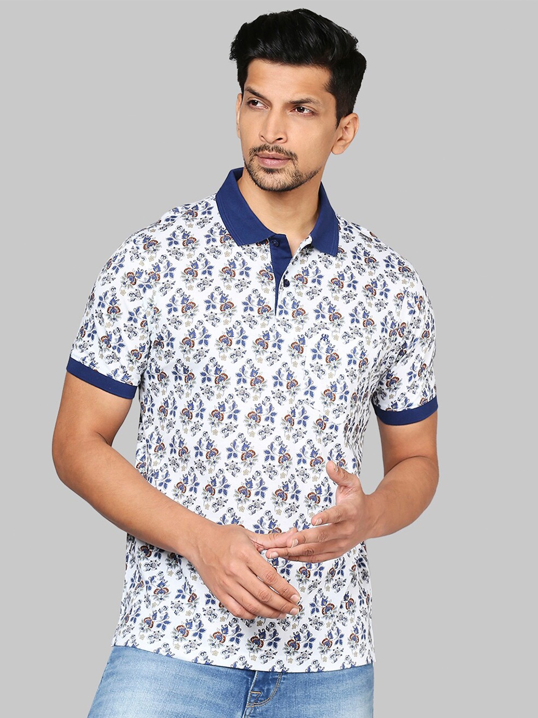 

Raymond Men White & Blue Floral Printed Polo Collar T-shirt