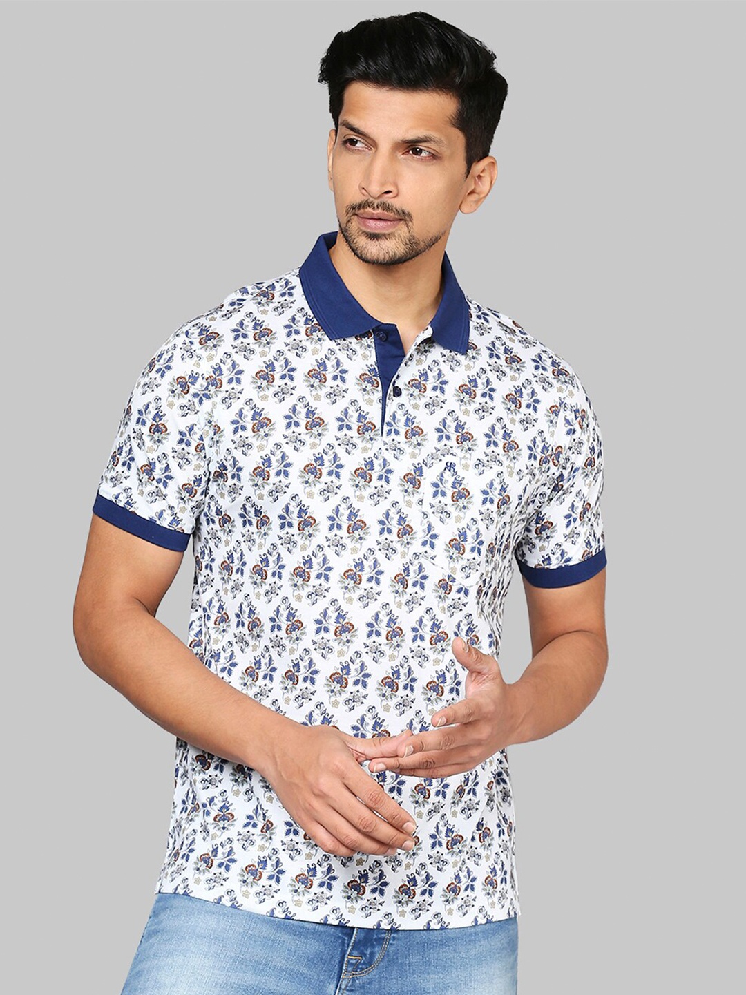 

Raymond Men White & Blue Floral Printed Polo Collar T-shirt