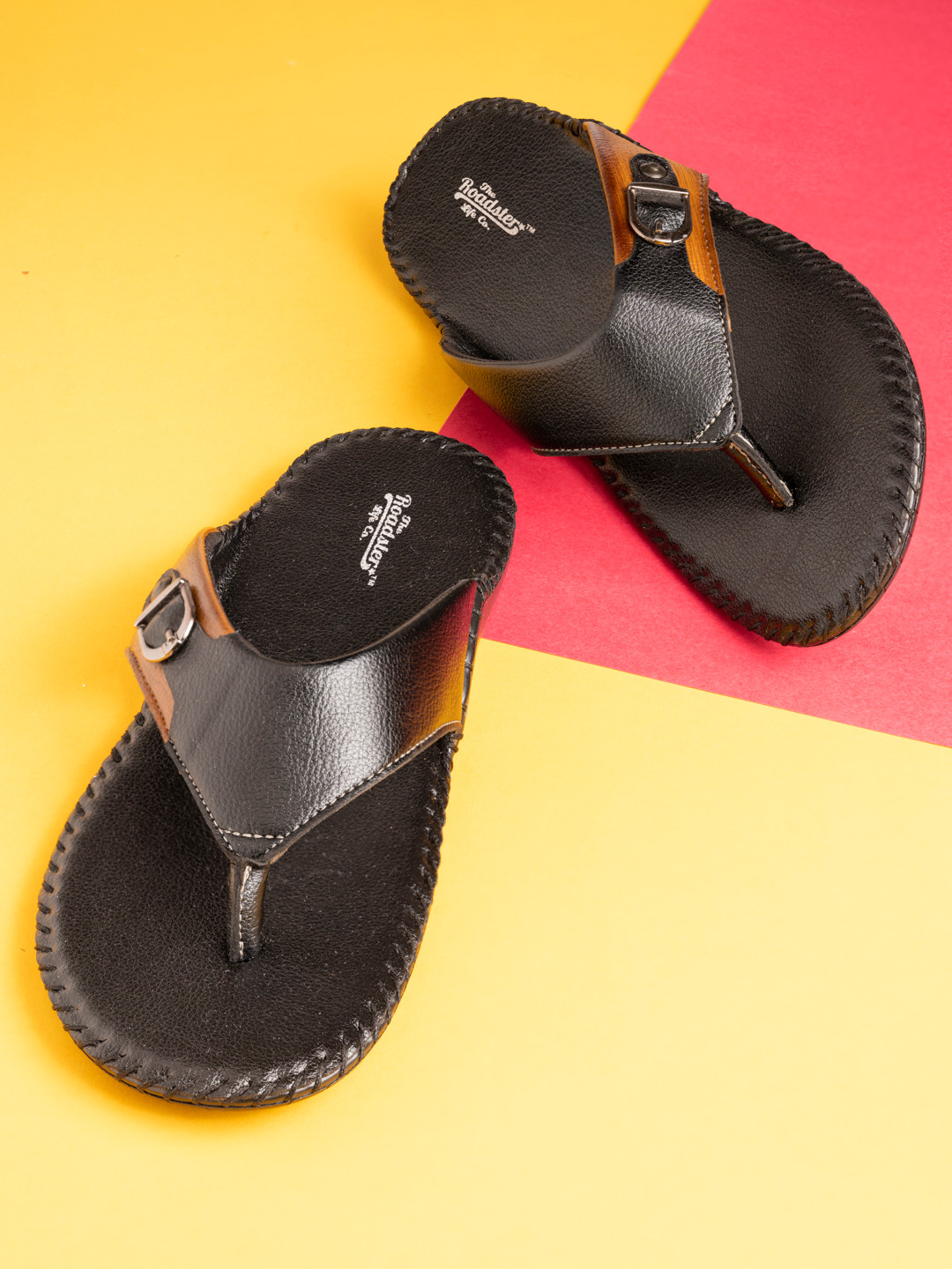 

Roadster Men Black & Tan Solid Slip-On