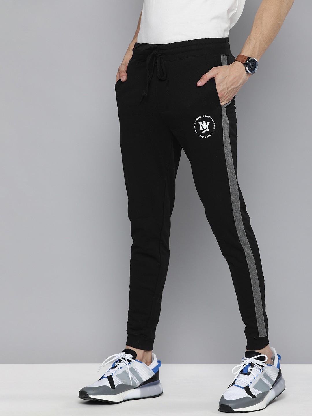

The Indian Garage Co Men Black & Grey Solid Slim Fit Joggers With Side Stripes