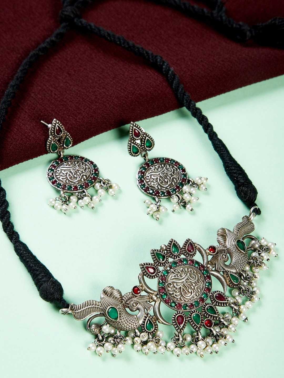 

GloBox By ZeroKaata Oxidised Silver-Plated Green & Red Gemstone-Studded & Beaded Antique Jewellery Set
