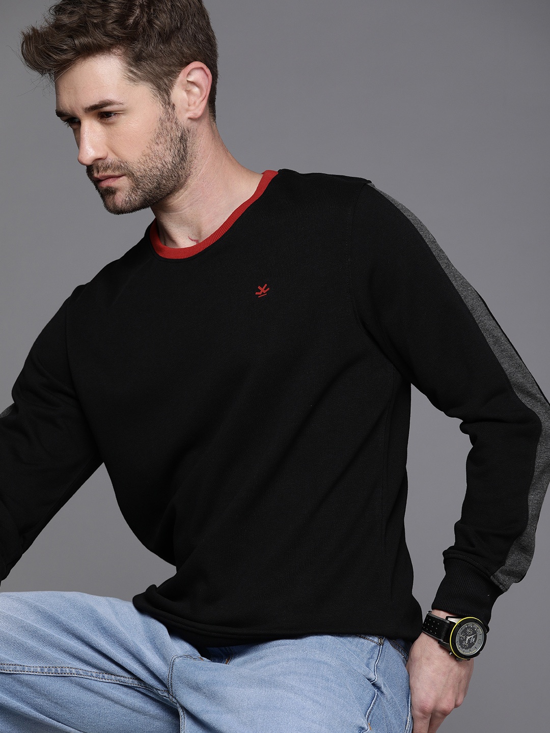 

WROGN Men Black Solid Round-Neck Slim Fit Pullover Sweatshirt With Side Stripes