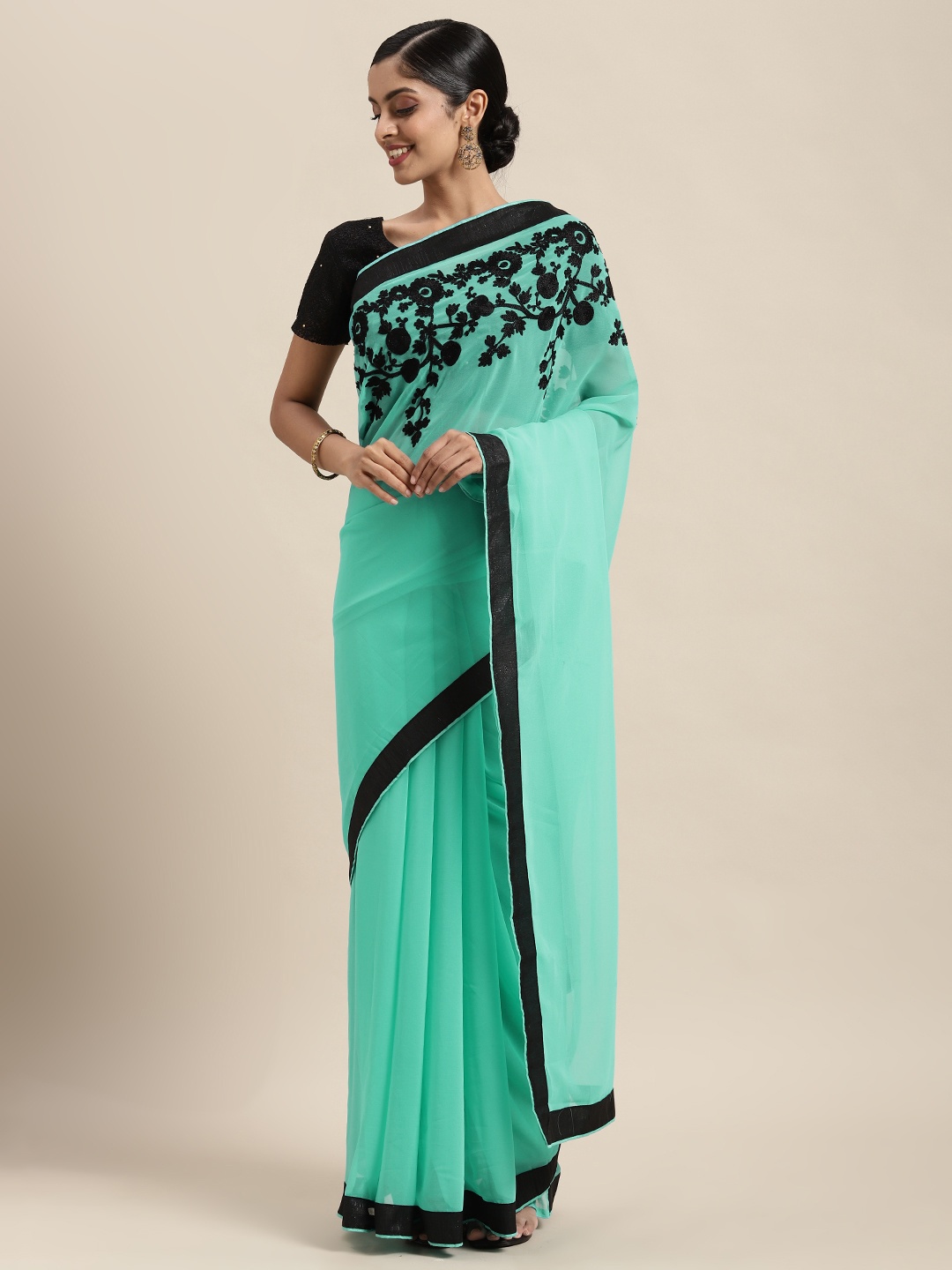 

Satrani Blue & Black Floral Pure Georgette Saree