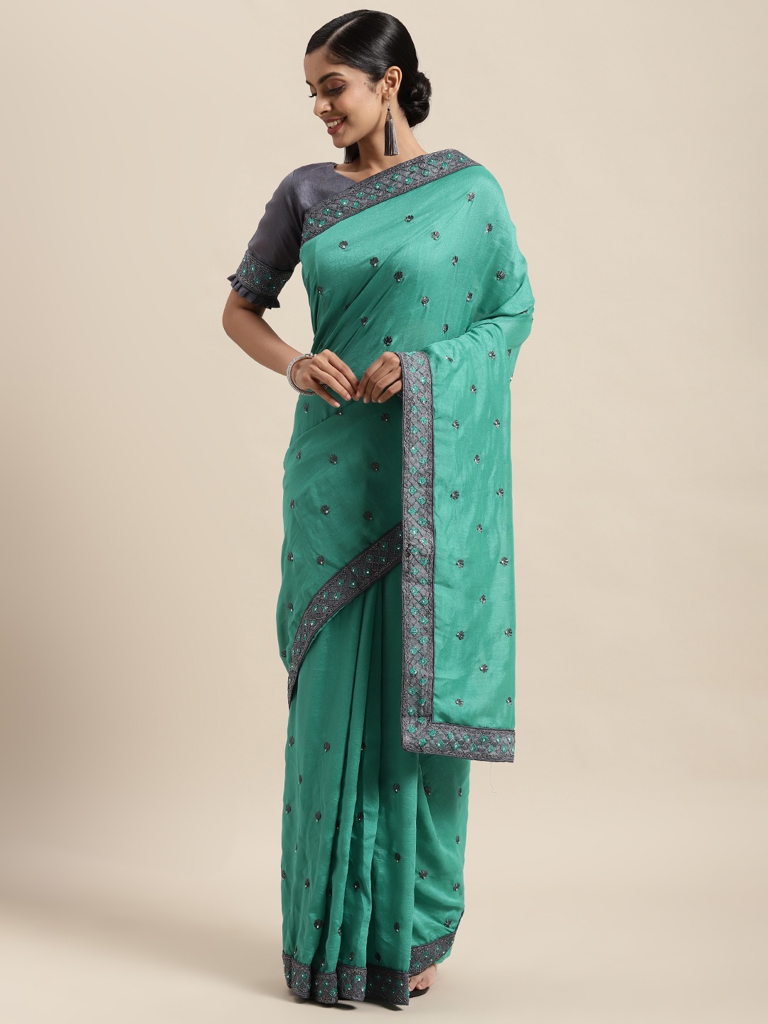 

Satrani Sea Green & Grey Ethnic Motifs Saree