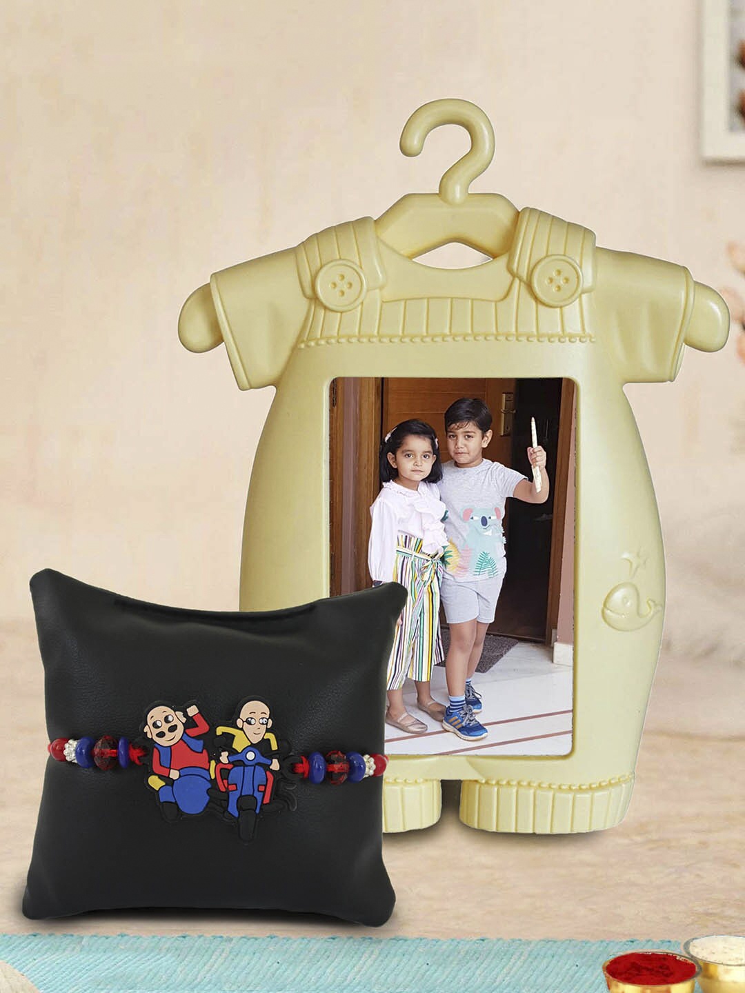 

TIED RIBBONS Boys Multicoloured Motu Patlu Rakhi with Photo Frame Gift Set, Multi