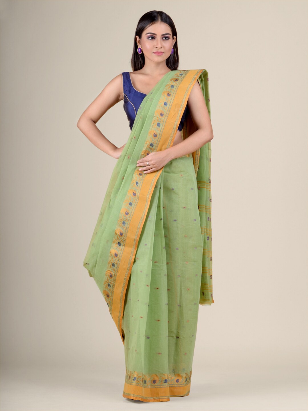 

Charukriti Green & Orange Woven Design Pure Cotton Taant Saree