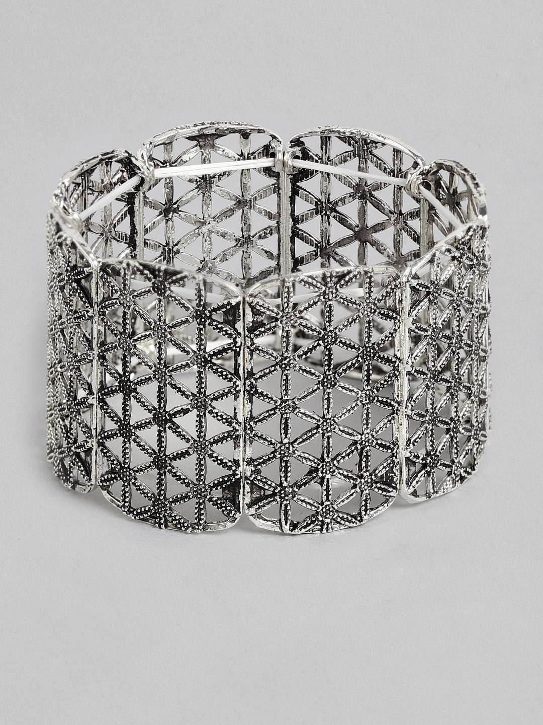 

Kord Store Women Oxidised Silver-Toned Floral Textured Elasticated Bracelet