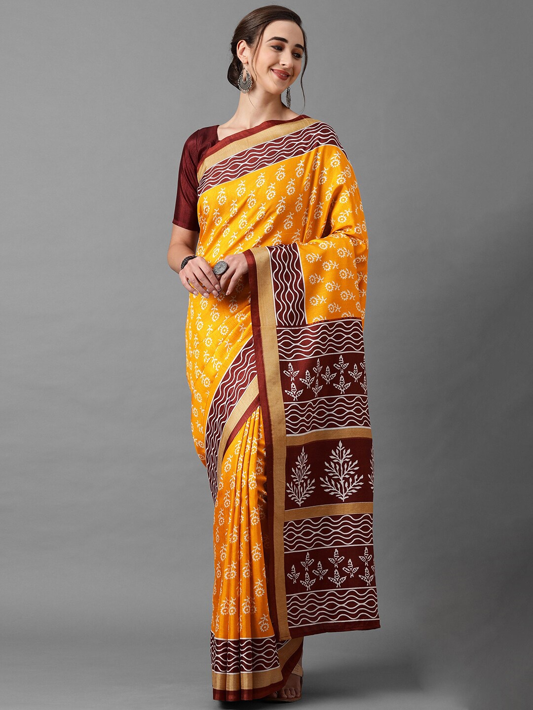 

Mitera Mustard & Maroon Floral Zari Art Silk Saree