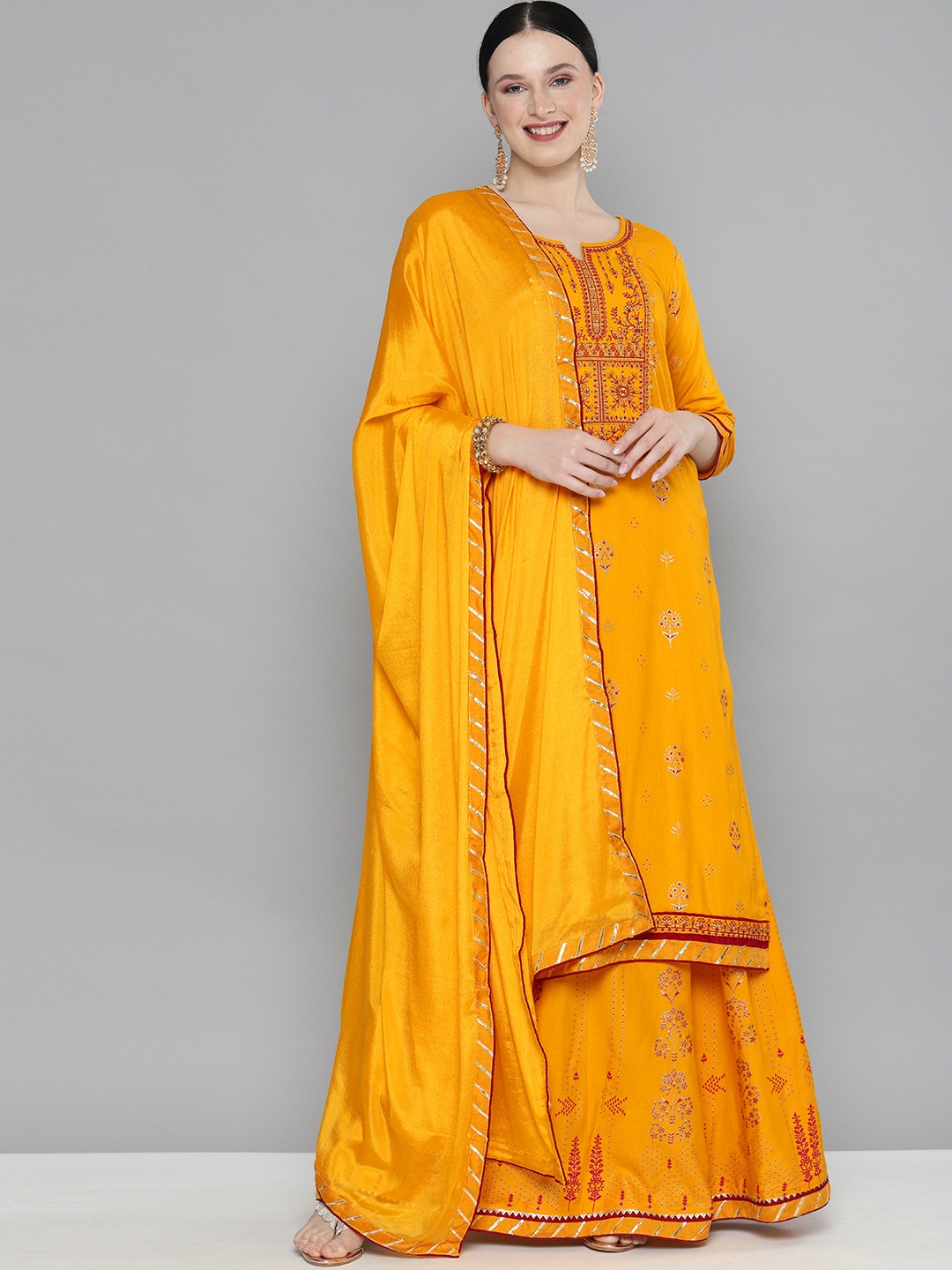 

Kvsfab Women Mustard Yellow Ethnic Motifs Regular Kurta with Skirt With Dupatta