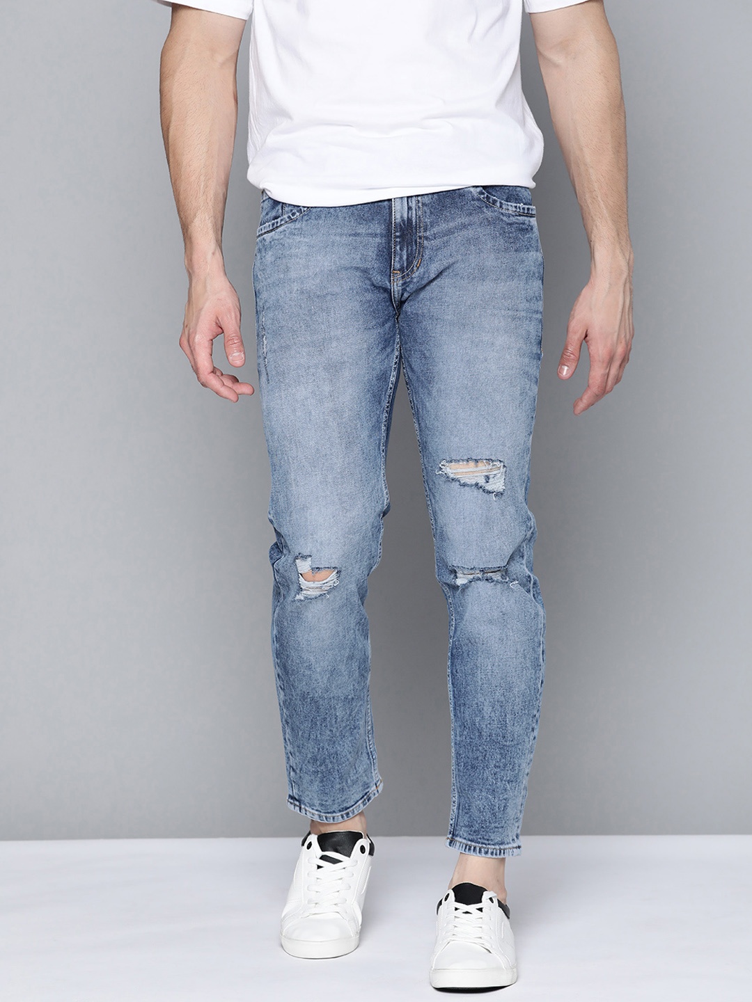 

Mast & Harbour Men Blue Slim Tapered Fit Mildly Distressed Light Fade Stretchable Jeans