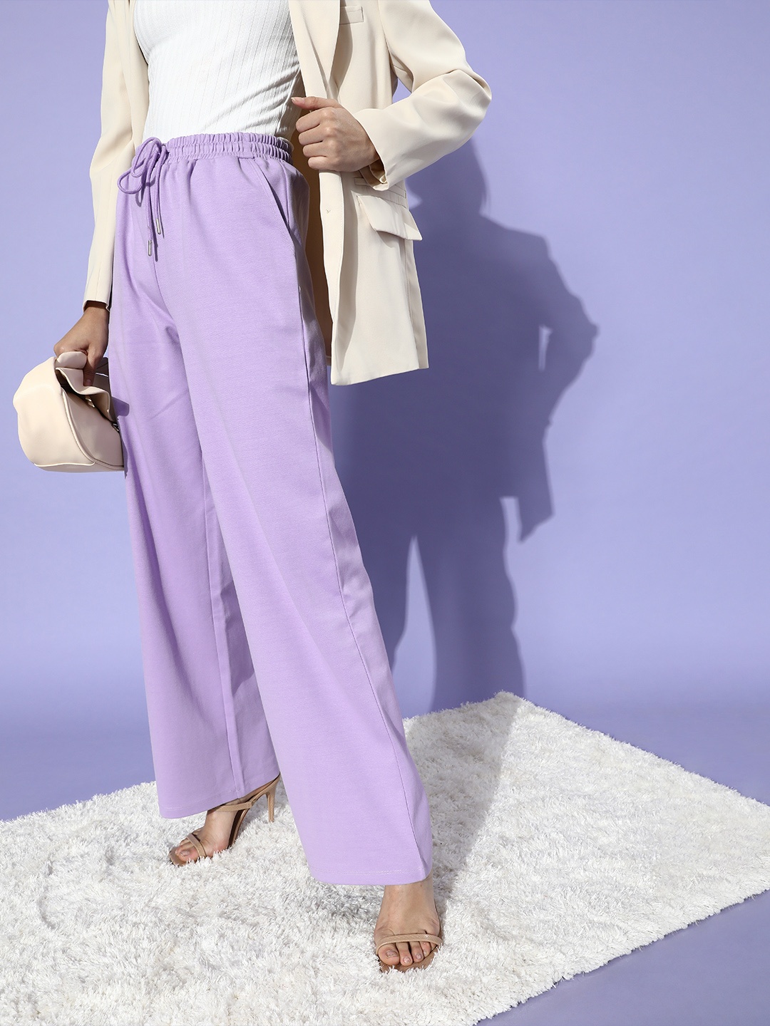 

Moda Rapido Women Lavender Solid Kick Flare Trousers