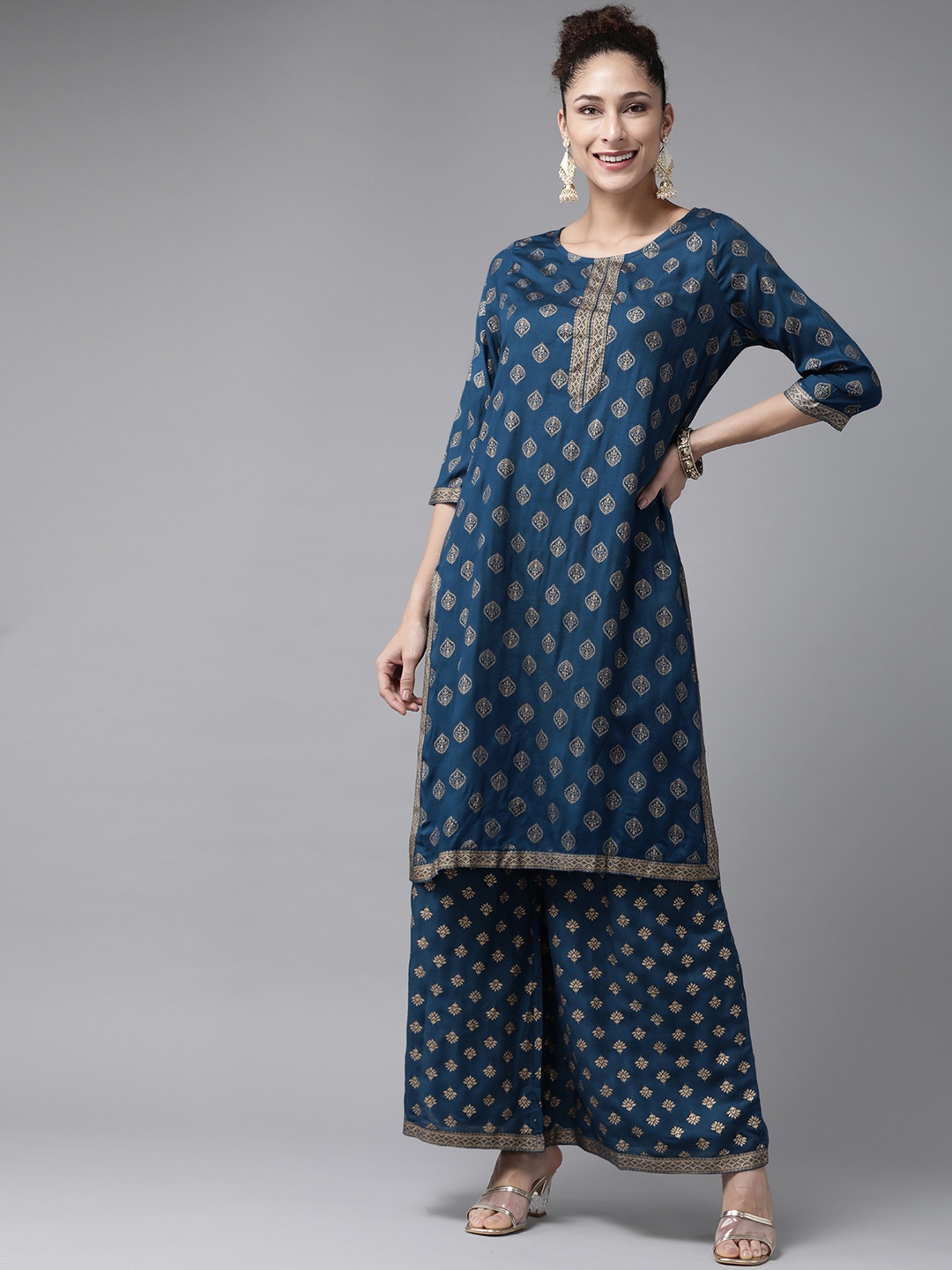 

ANMI Women Teal Blue & Golden Ethnic Motifs Print Straight Kurta with Palazzos