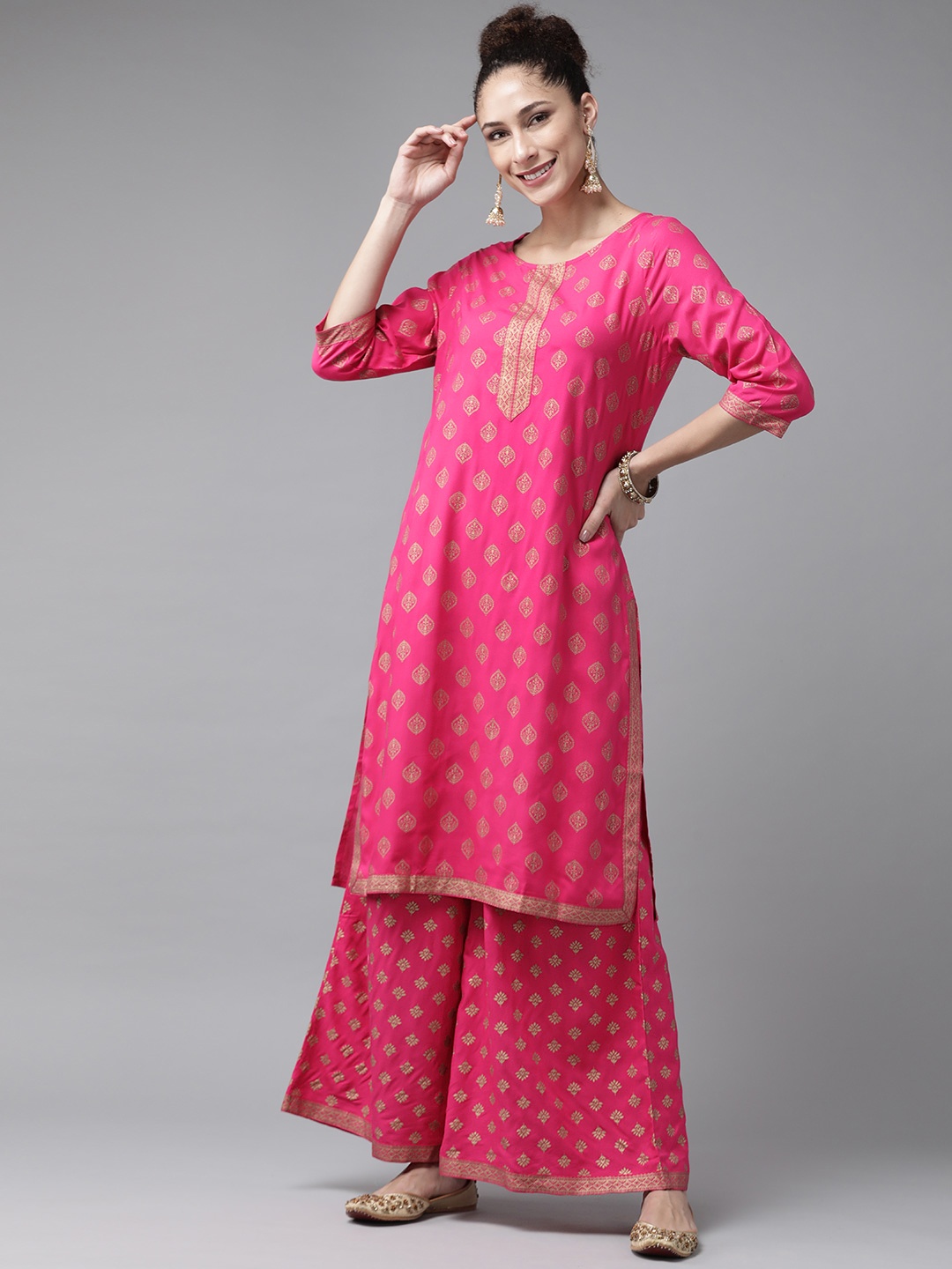

ANMI Women Pink & Golden Ethnic Motifs Print Straight Kurta with Palazzos