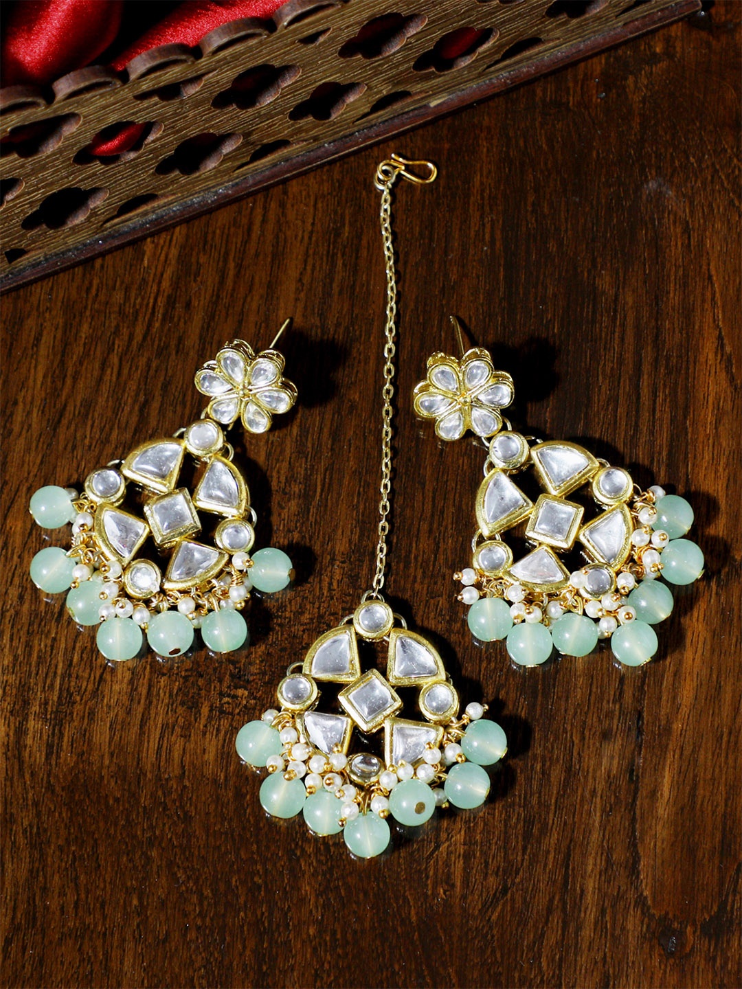 

KARATCART Gold-Plated White Kundan-Studded & Green Beaded Handcrafted Jewellery Set