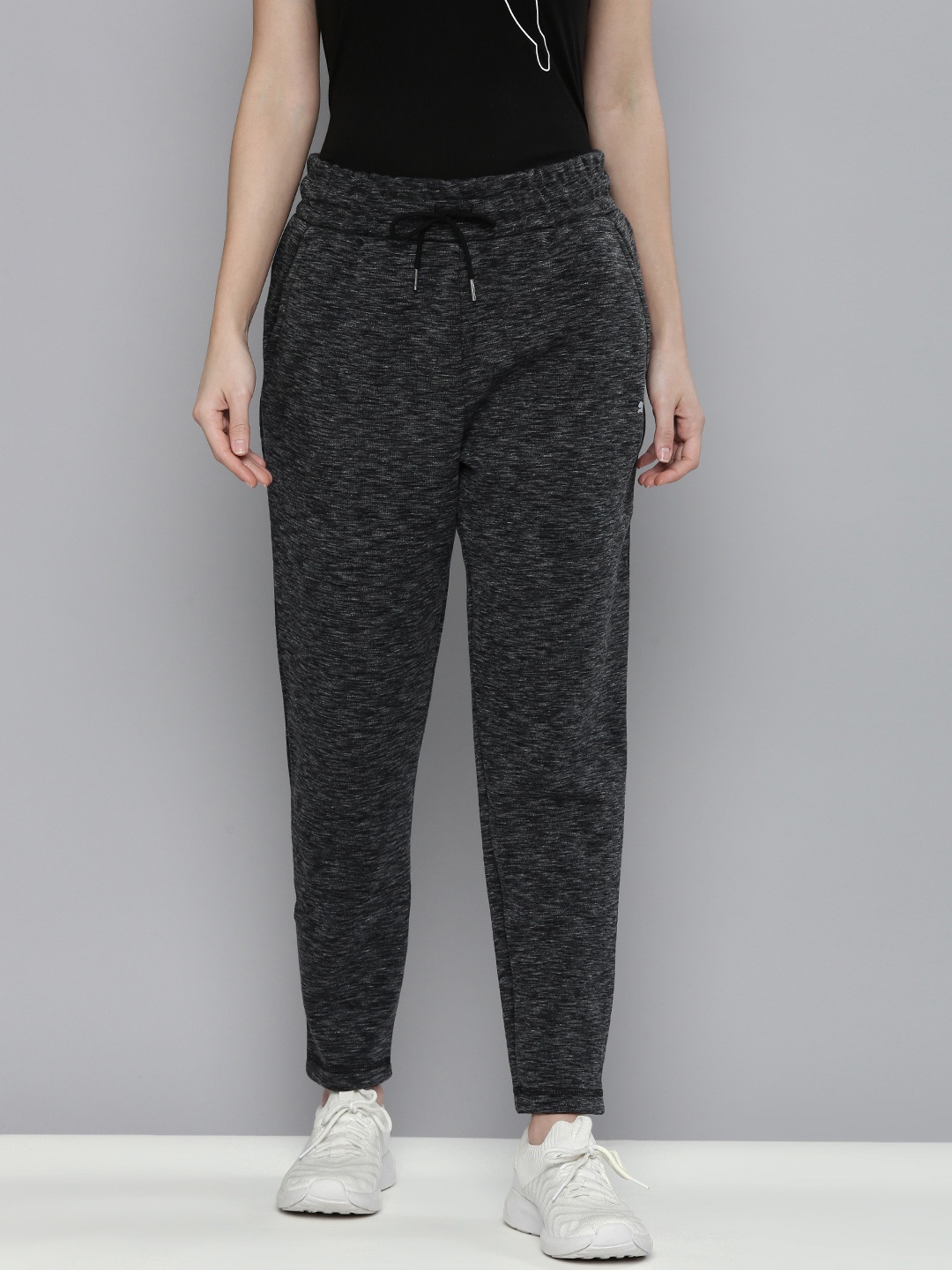 

Puma Women Black Printed Regular Fit DryCell Evostripe Track Pants