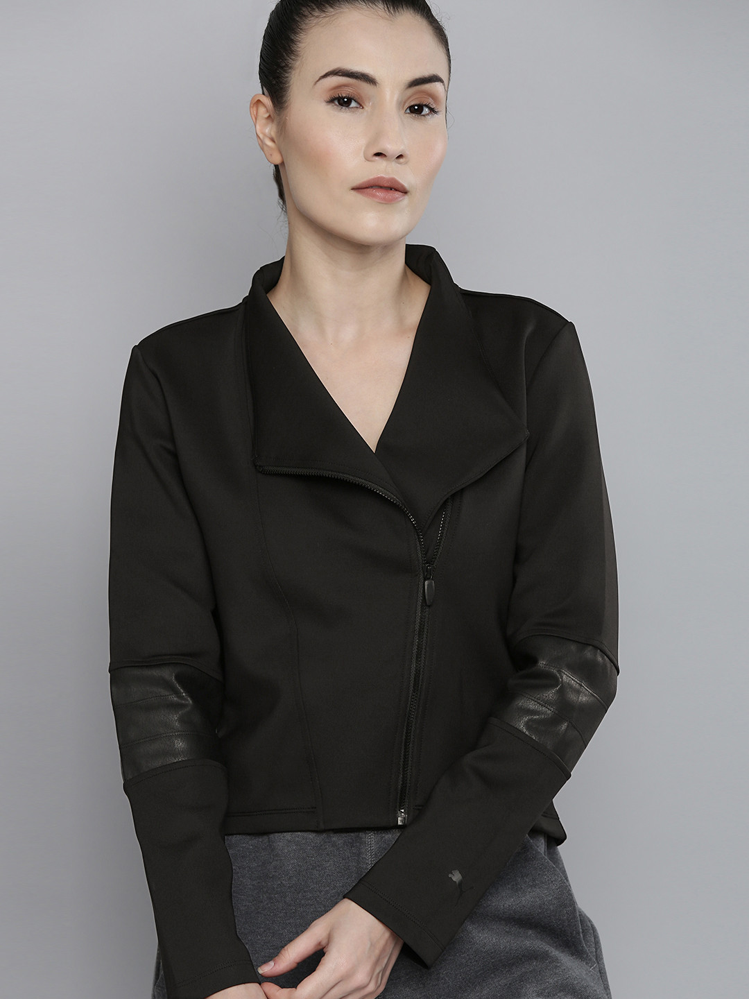 

Puma Women Black Solid Moto Regular Fit Jacket With Asymmetrical Zip Closure