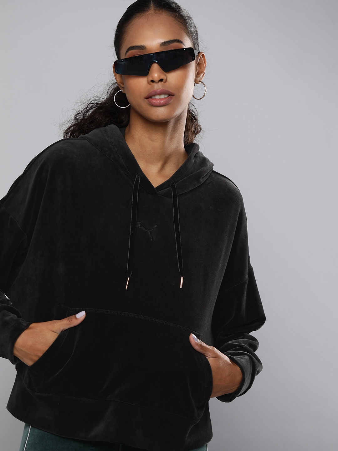 

Puma Women Black Solid Hooded Sweatshirt