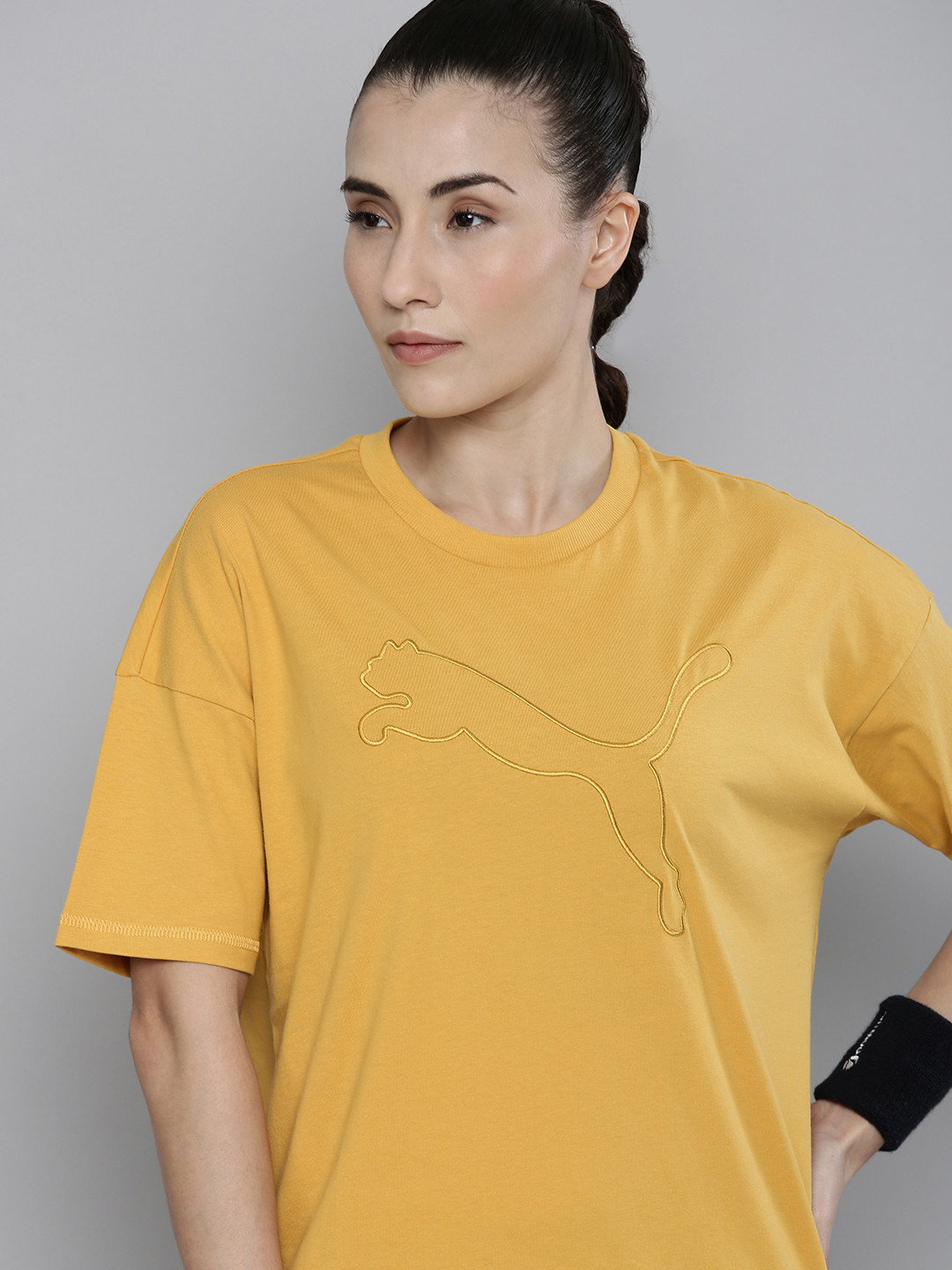 

Puma Women Yellow Striped Pure Cotton T-shirt