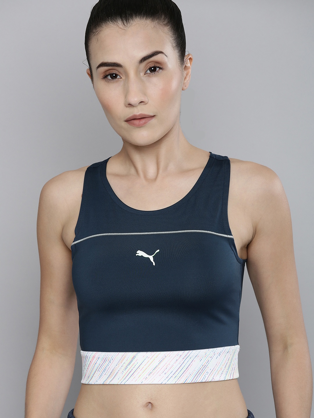 

Puma Women Navy Blue Brand Logo Printed Slim Fit RUN High Shine Cropped Tank Top