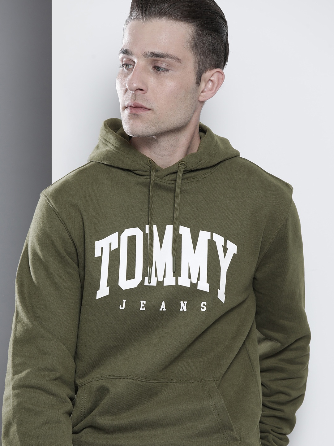 

Tommy Hilfiger Men Olive Green Printed Hooded Sweatshirt