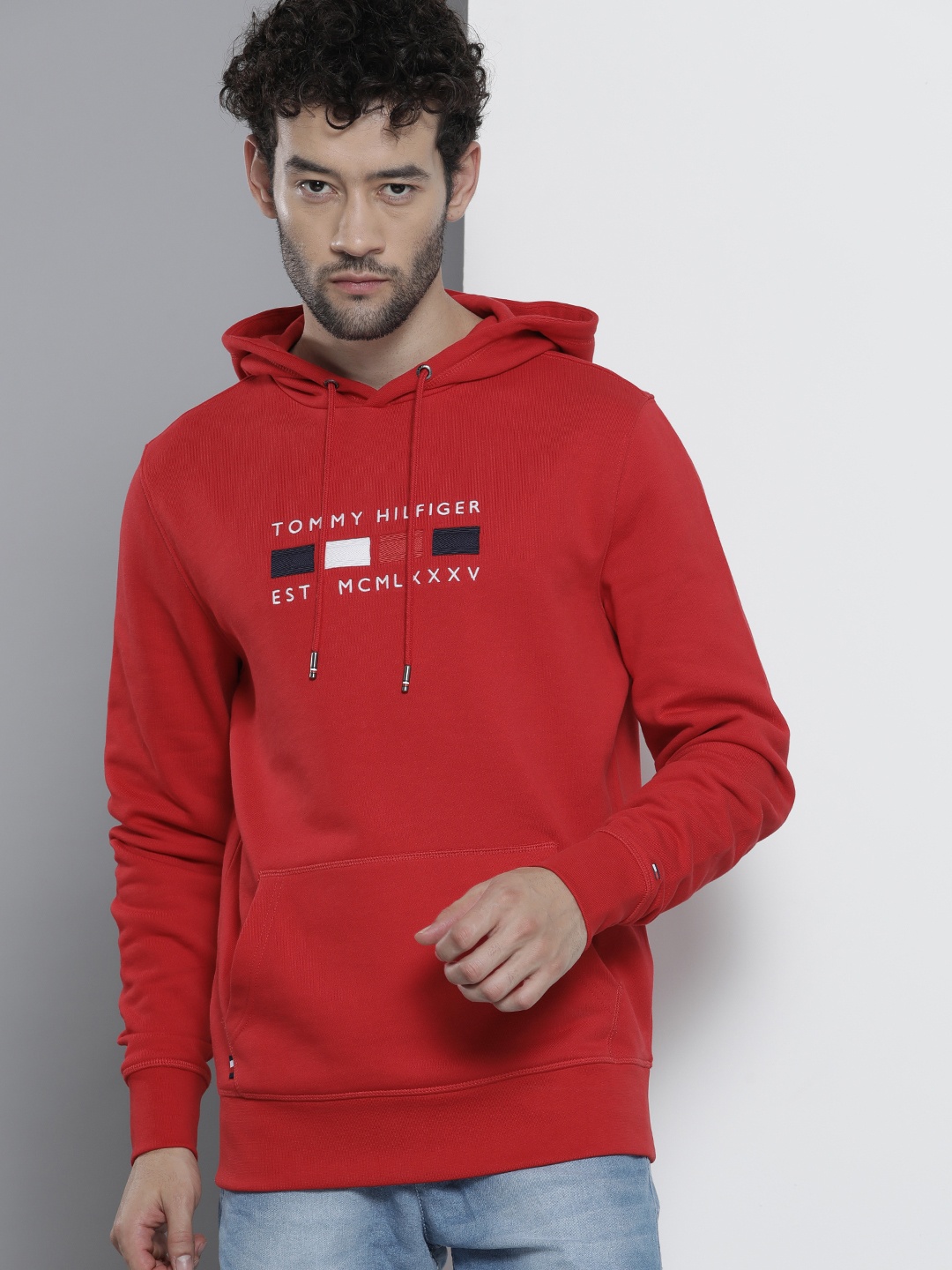 

Tommy Hilfiger Men Red Solid Brand Logo Organic Cotton Hooded Sweatshirt
