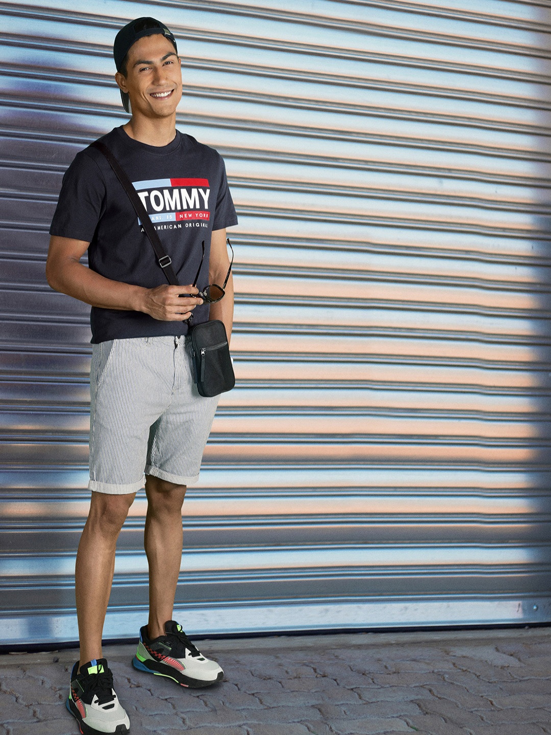 

Tommy Hilfiger Men Navy Blue Brand Logo Printed Pure Cotton T-shirt