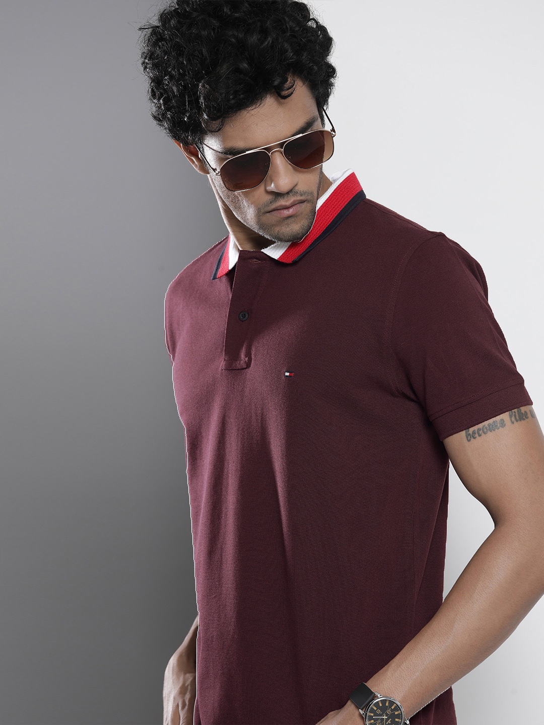 

Tommy Hilfiger Men Burgundy Solid Pure Cotton Polo Collar T-shirt