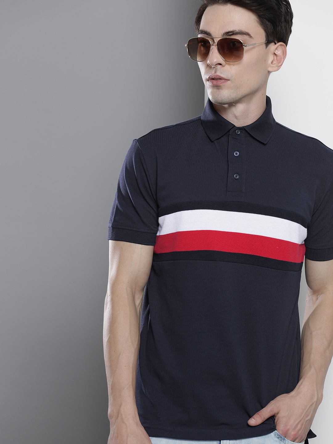 

Tommy Hilfiger Men Navy Blue & White Striped Polo Collar Organic Cotton T-shirt