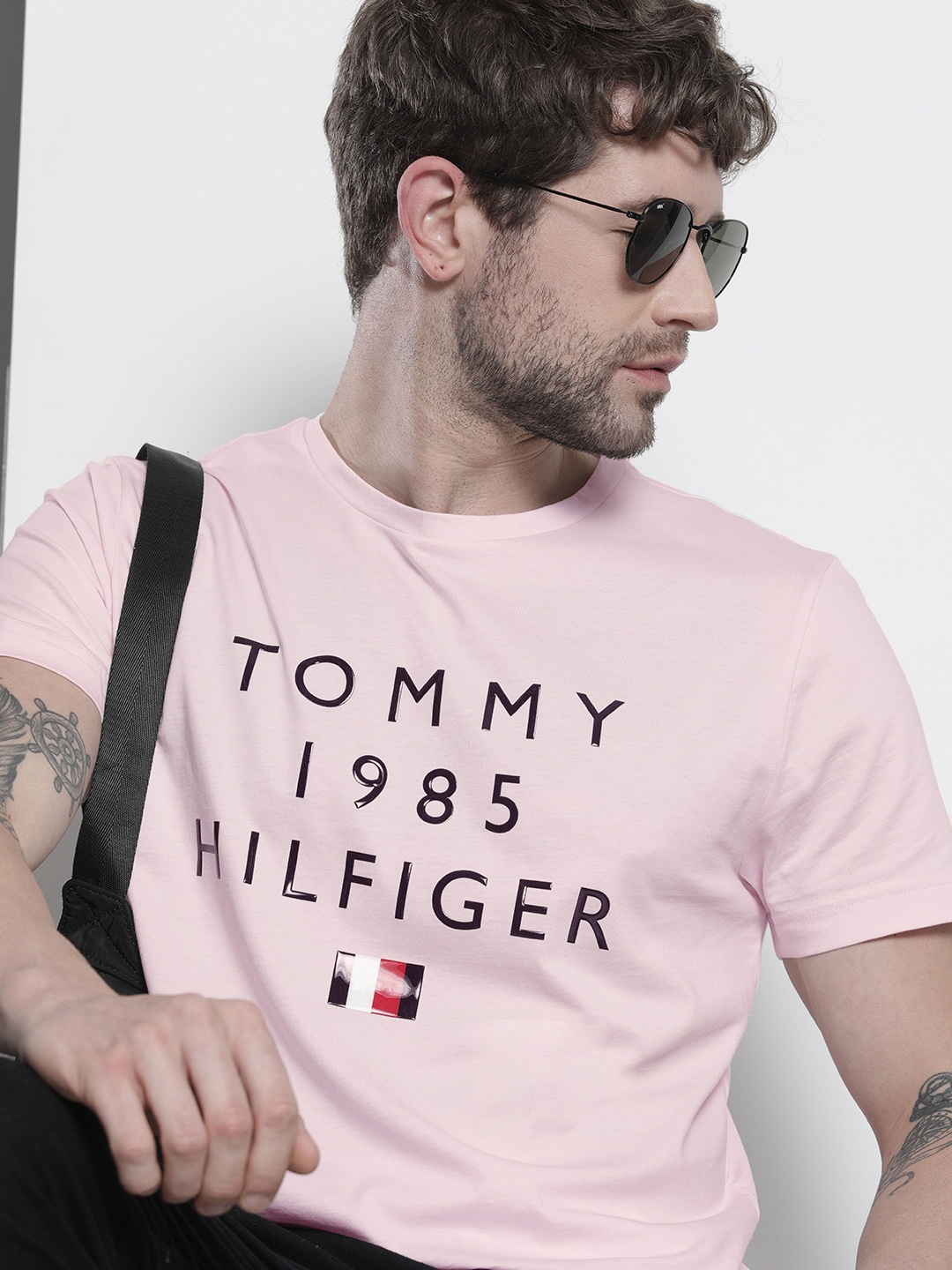 

Tommy Hilfiger Men Pink Brand Logo Printed Pure Cotton T-shirt