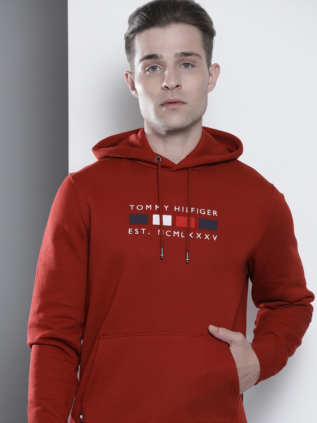 

Tommy Hilfiger Men Maroon & White Brand Logo Embroidered Hooded Sweatshirt
