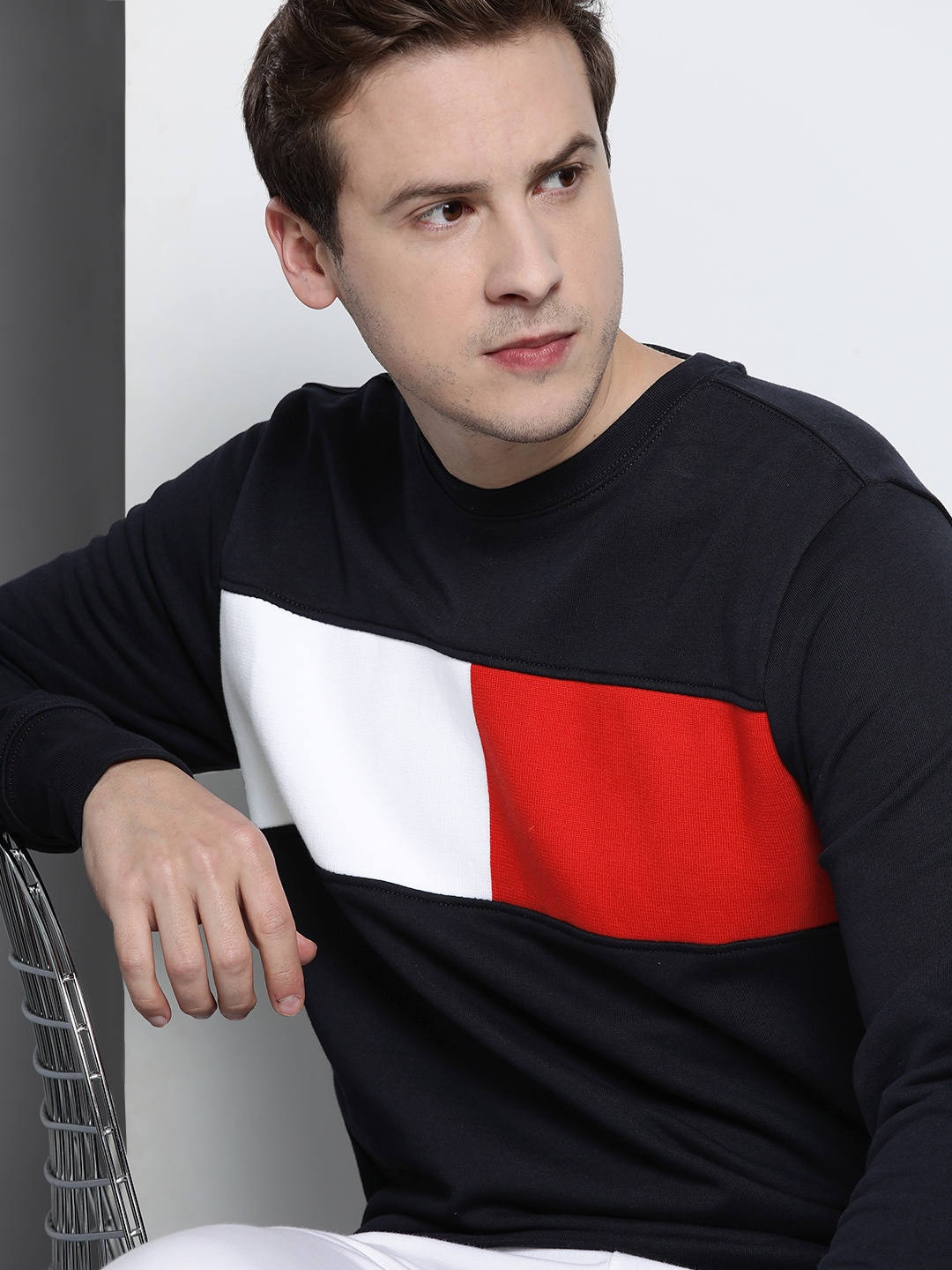 

Tommy Hilfiger Men Navy Blue & White Colourblocked Sweatshirt