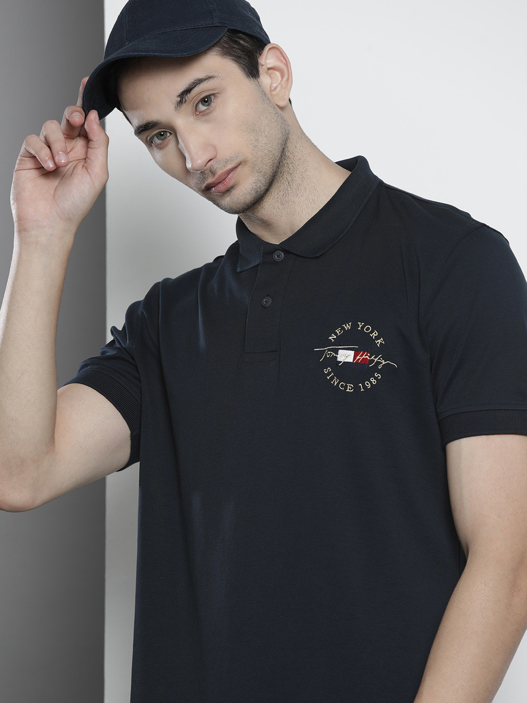 

Tommy Hilfiger Men Navy Blue Pure Cotton Polo Collar Pure Cotton T-shirt