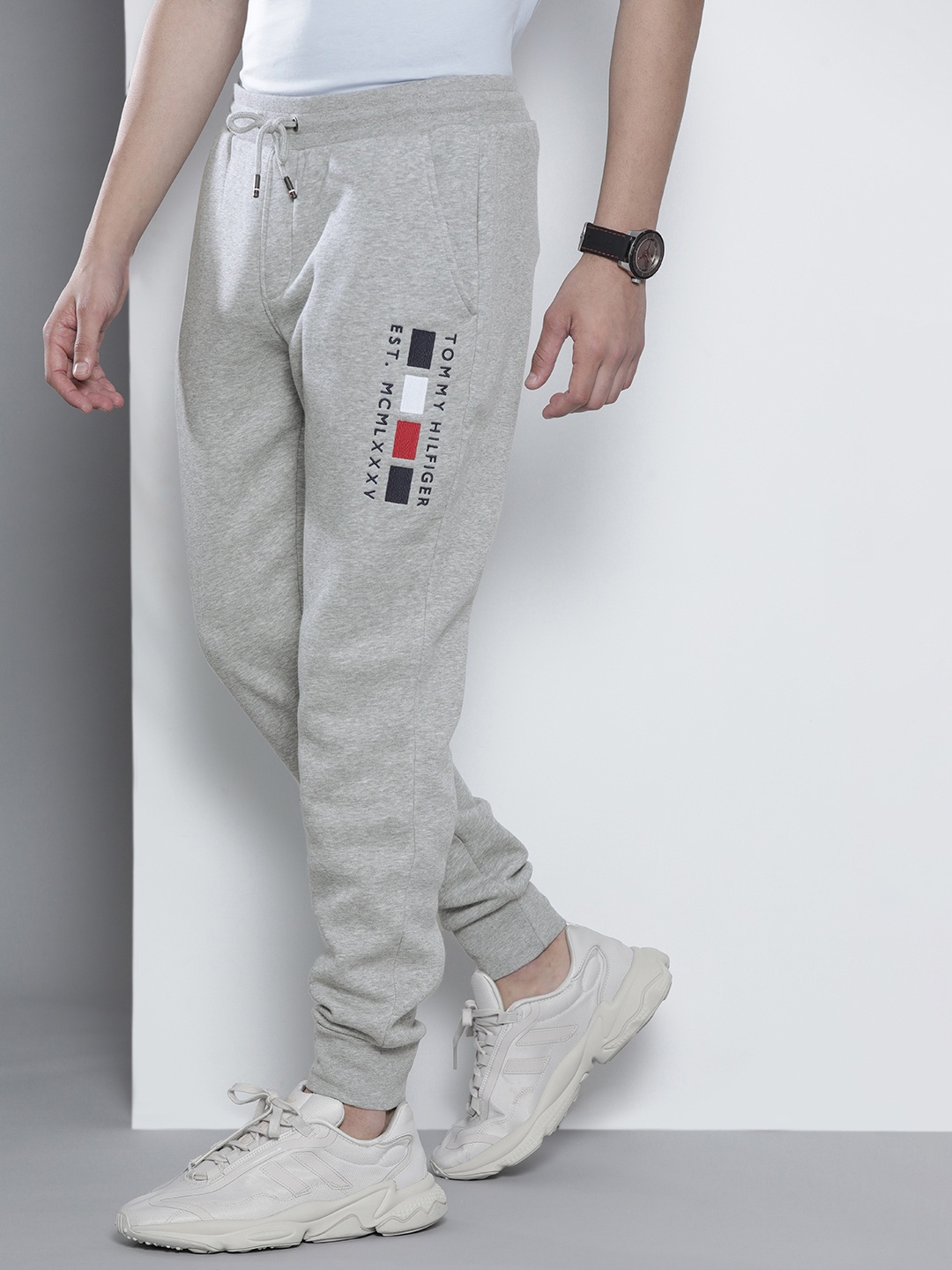 

Tommy Hilfiger Men Grey Melange Brand Logo Embroidered Joggers