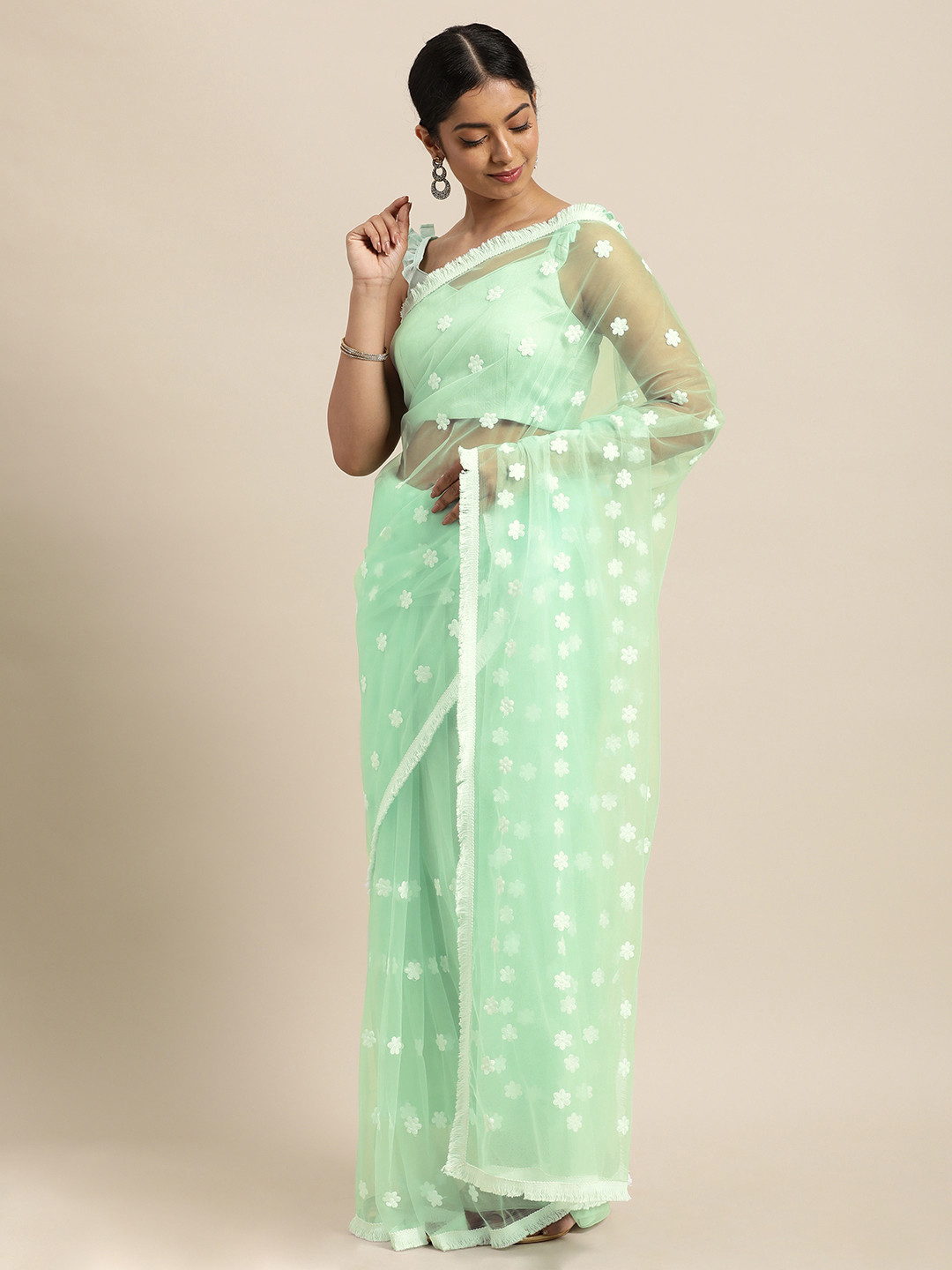 

Janasya Sea Green Floral Embroidered Net Saree