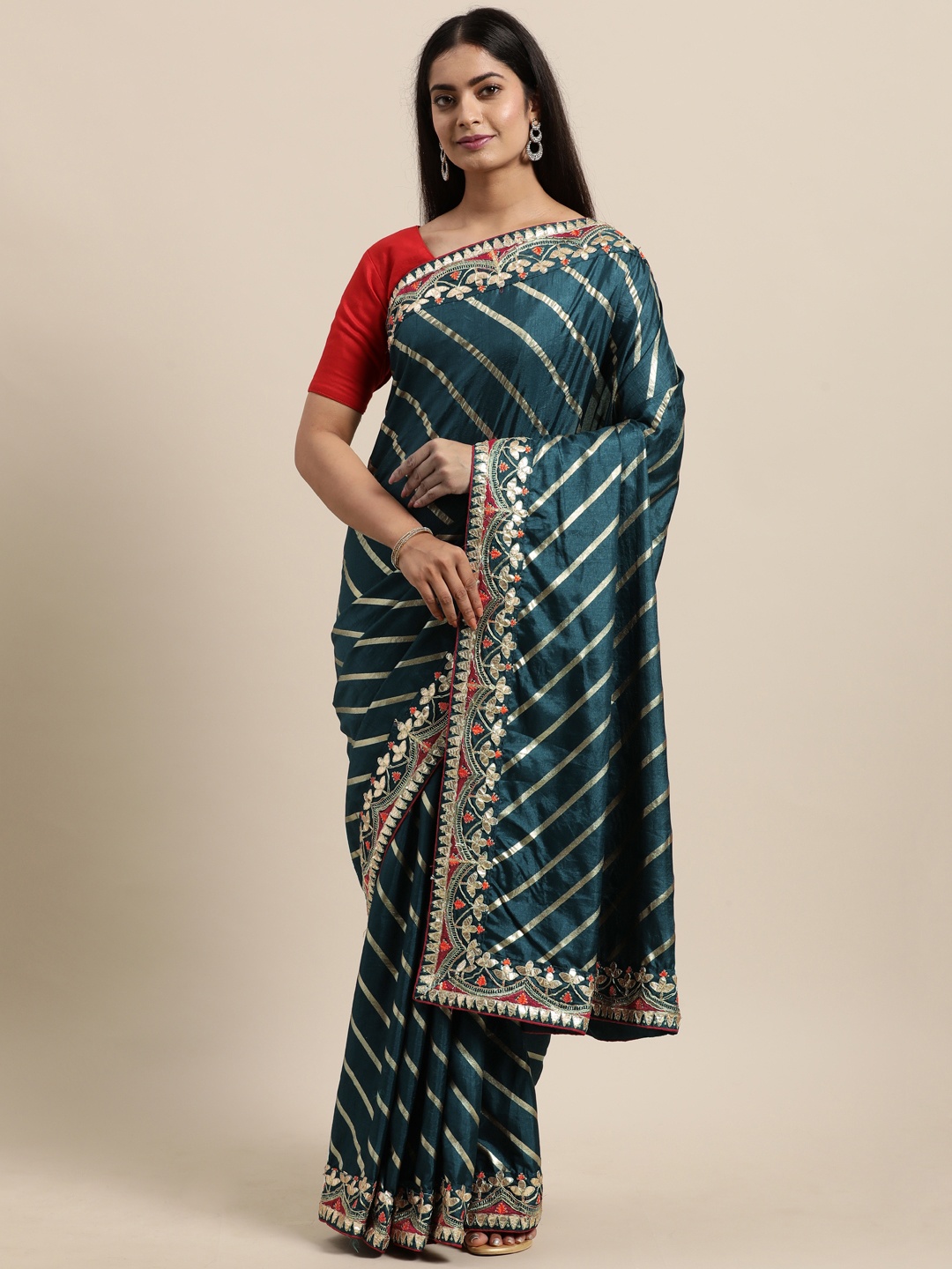 

Mitera Teal Blue Striped Poly Silk Saree