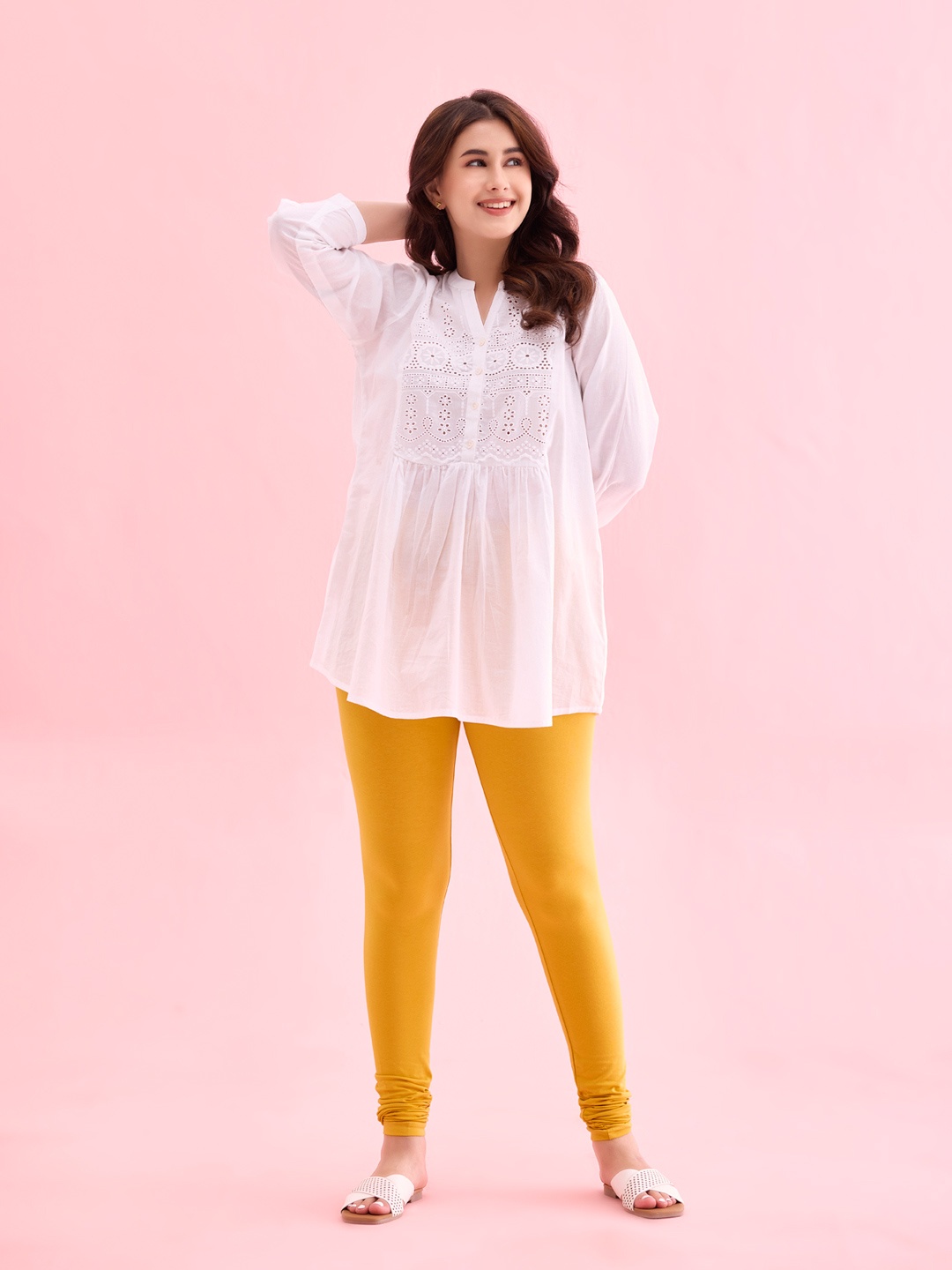 

Go Colors Women Yellow Solid Cotton Churidar-Length Leggings