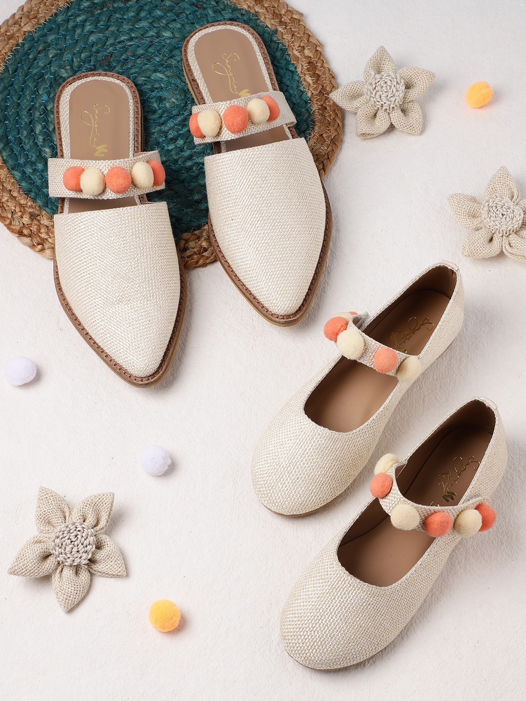 

Sangria Women Cream-Coloured Woven Design Mules with Pom Pom Detail