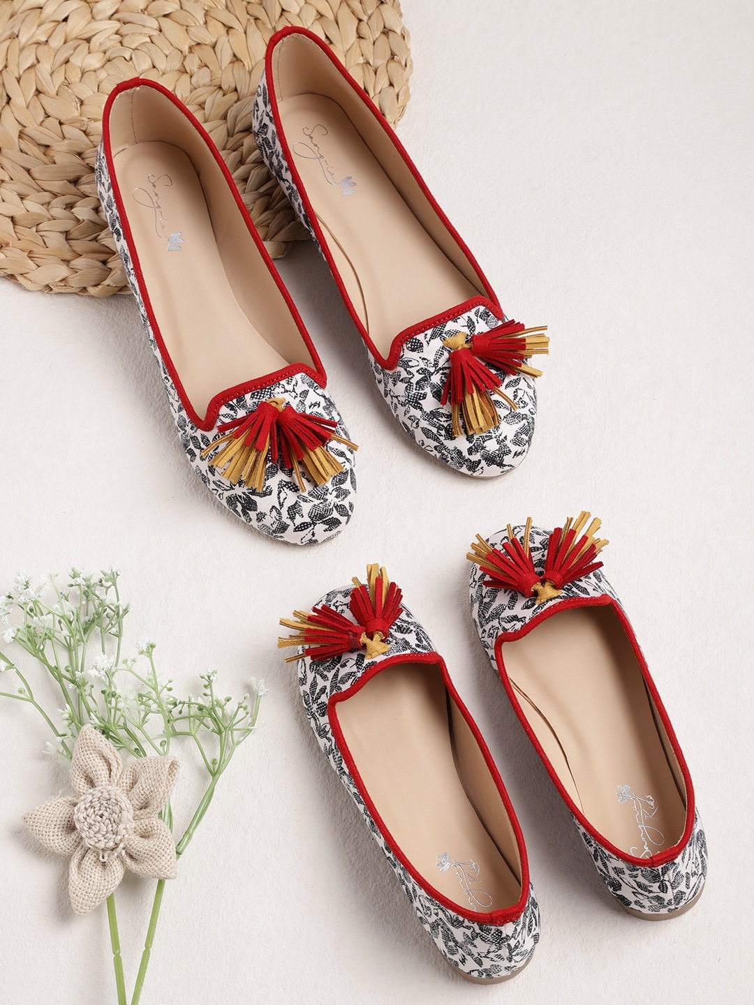 

Sangria Women White & Black Floral Print Ballerinas with Tassels