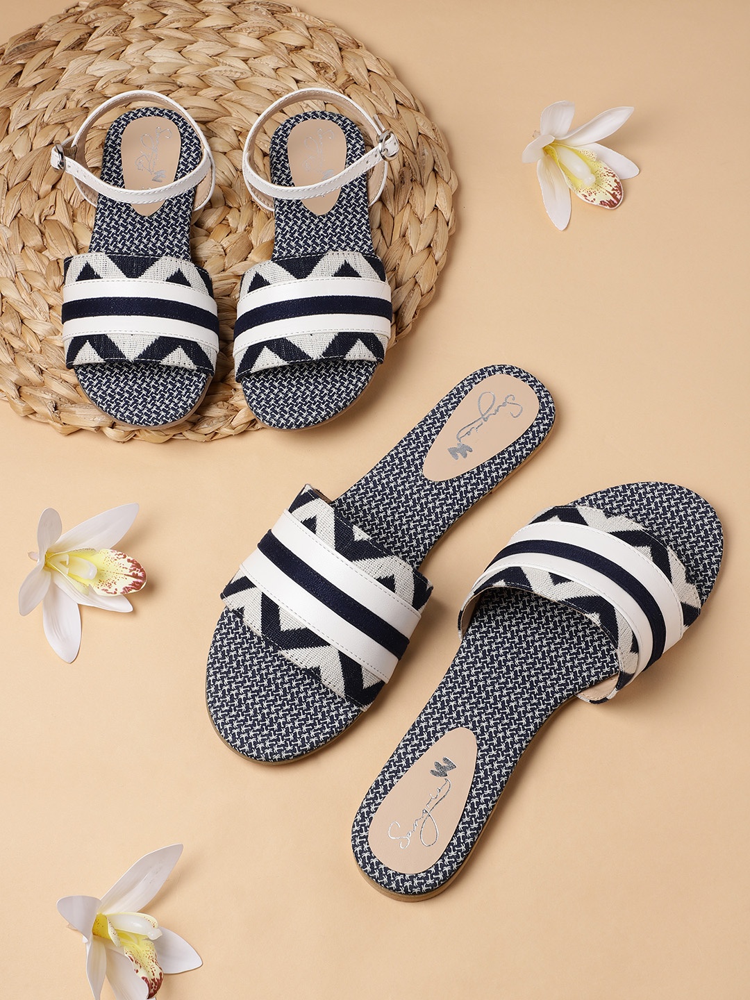 

Sangria Women Navy Blue & White Striped & Woven Design Open Toe Flats