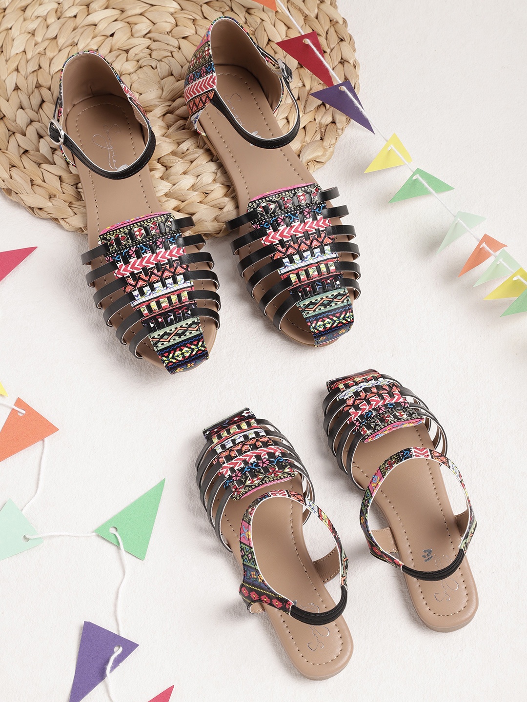 

Sangria Women Black & Pink Woven Design Flats with Ethnic Prints