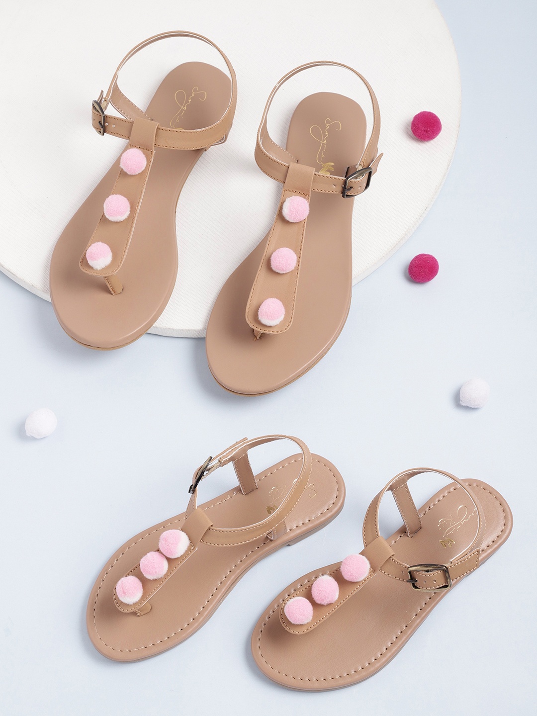 

Sangria Women Beige & Pink Pom-Pom Embellished Handcrafted T-Strap Flats