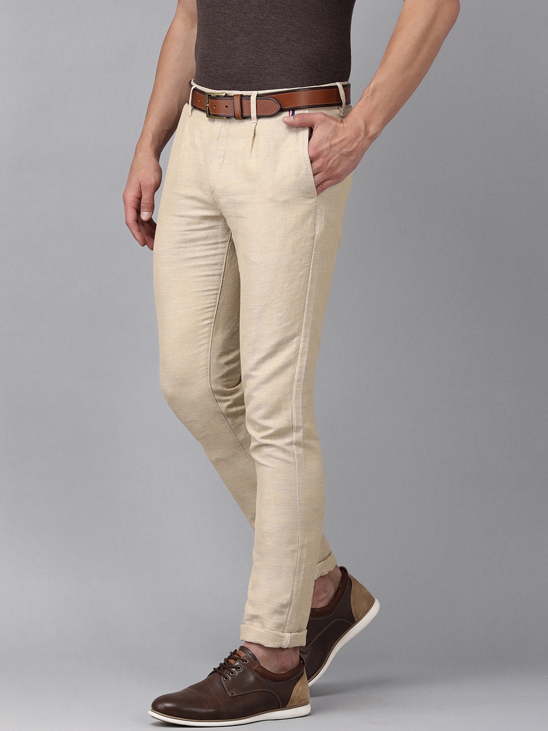 

U.S. Polo Assn. Men Beige Self-Design Austin Trim Fit Regular Trousers