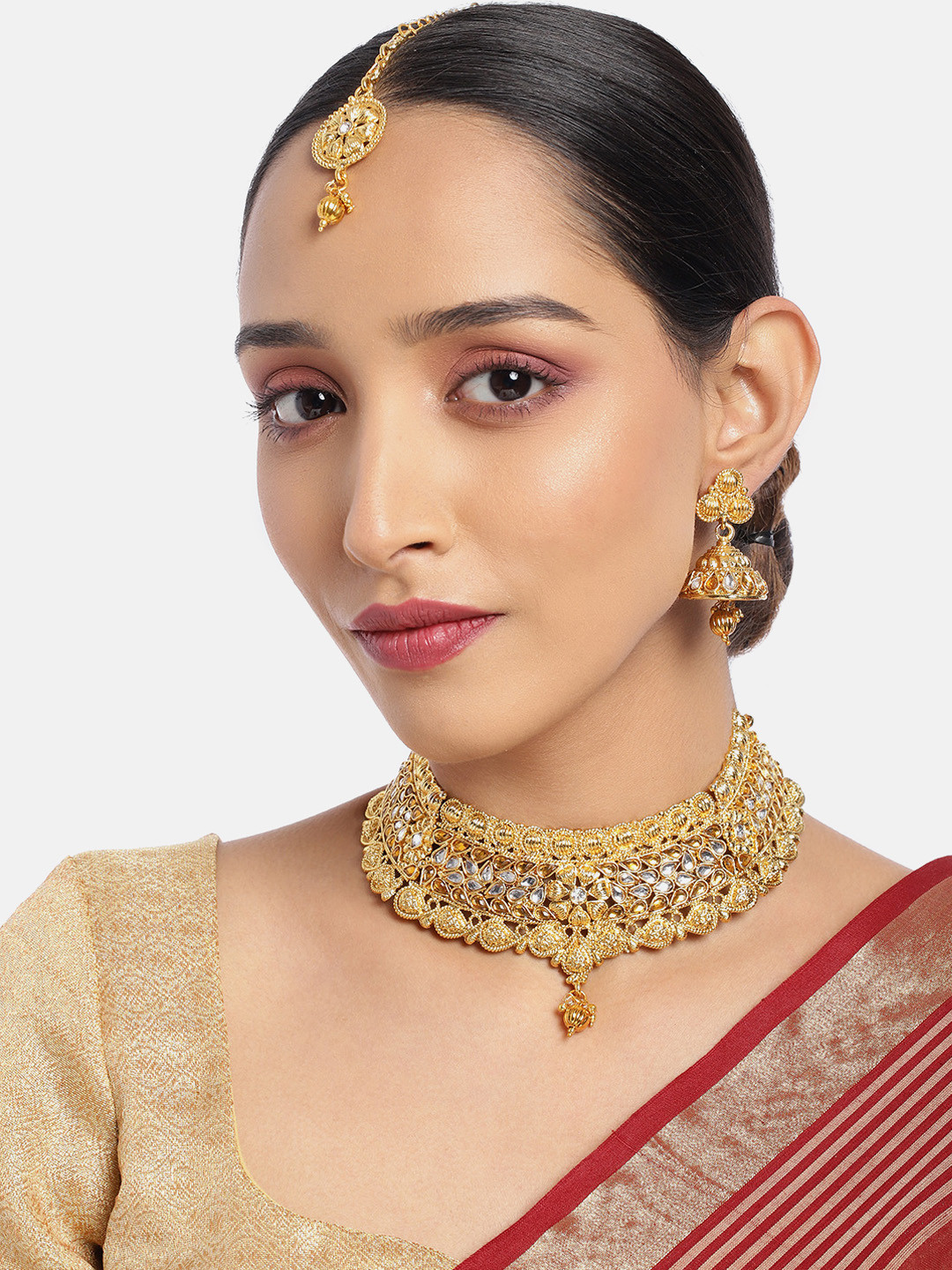 

ASMITTA JEWELLERY Women Gold-Toned & Red Kundan Studded Necklace Set with Maang Tika