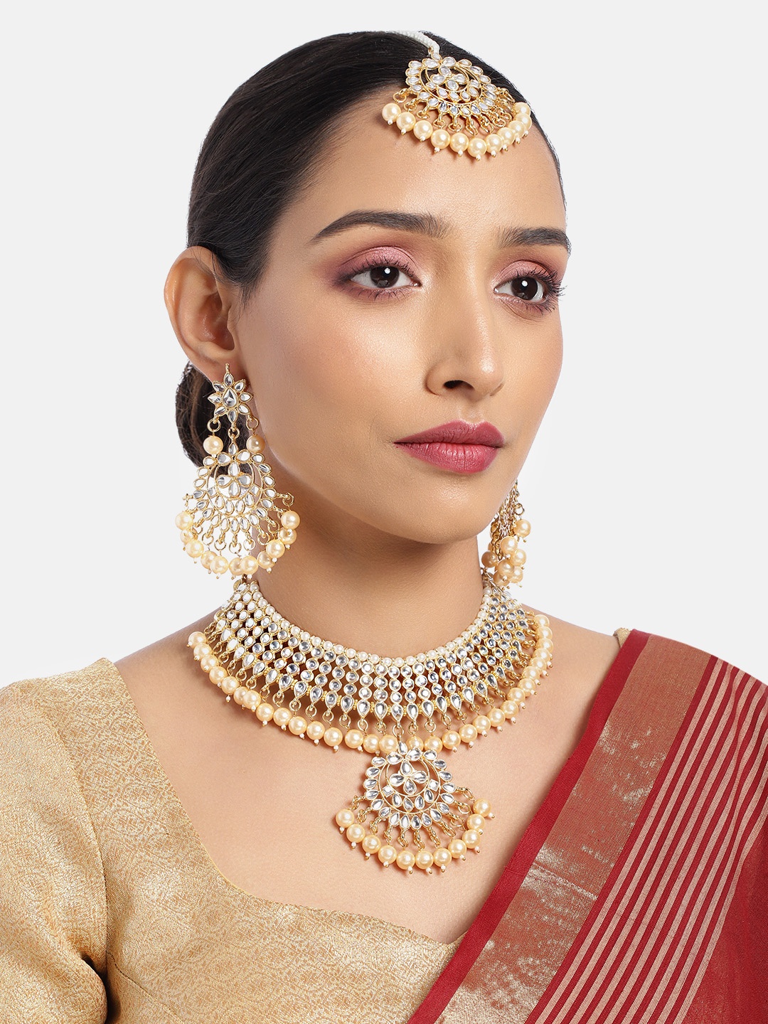 

ASMITTA JEWELLERY Women Gold-Toned Kundan Pearl Studded Necklace Set with Maang Tika