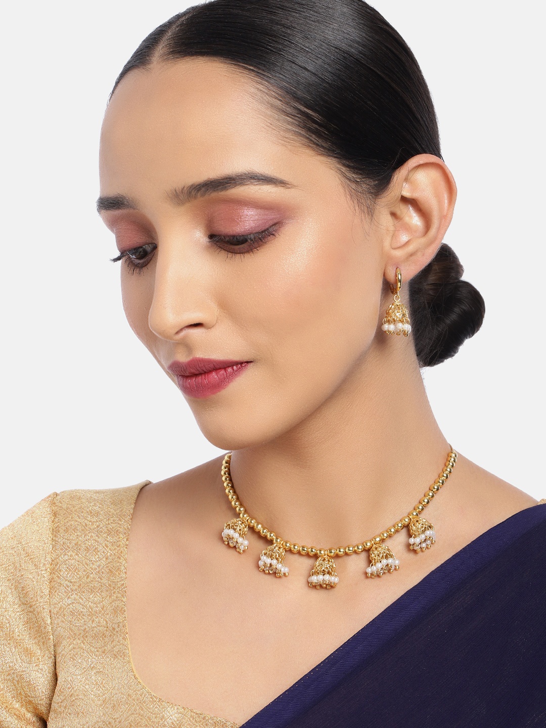 

ASMITTA JEWELLERY Traditional Look Gold Toned Choker Necklace Set