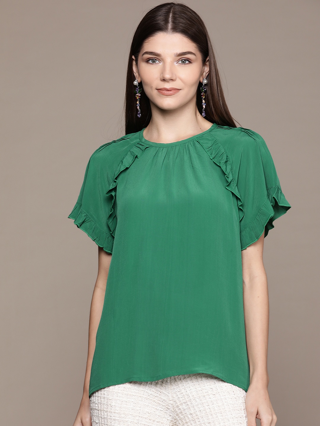 

Label Ritu Kumar Women Green Solid Flared Sleeves Regular Top