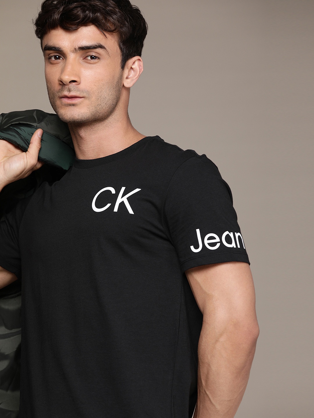 

Calvin Klein Jeans Men Black & White Brand Logo Printed Pure Cotton Round Neck T-shirt